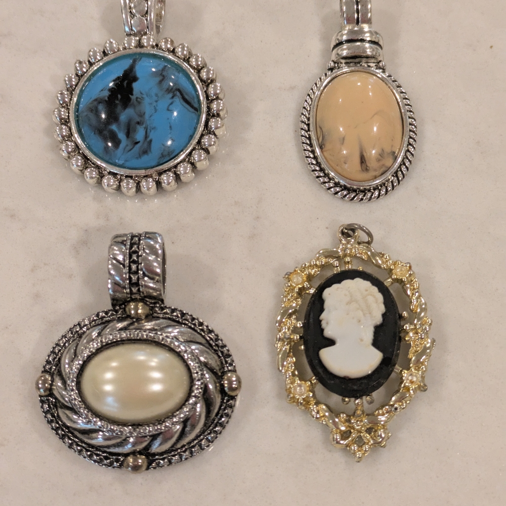 Silver and Gold Pendant Set Of 4